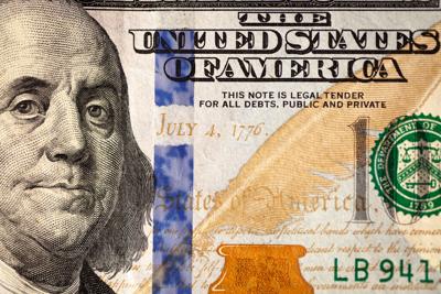FILE - Ben Franklin Money Government Spending Cash