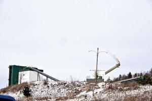 Blast brings down chimney at Piney Power plant