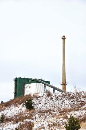 Blast brings down chimney at Piney Power plant