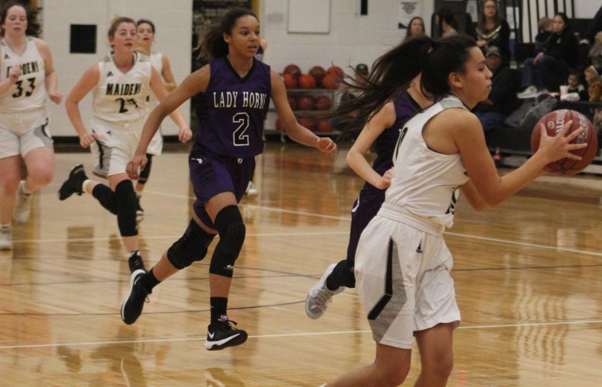 Early Lady Longhorns At Comanche Maidens Varsity Basketball Photo