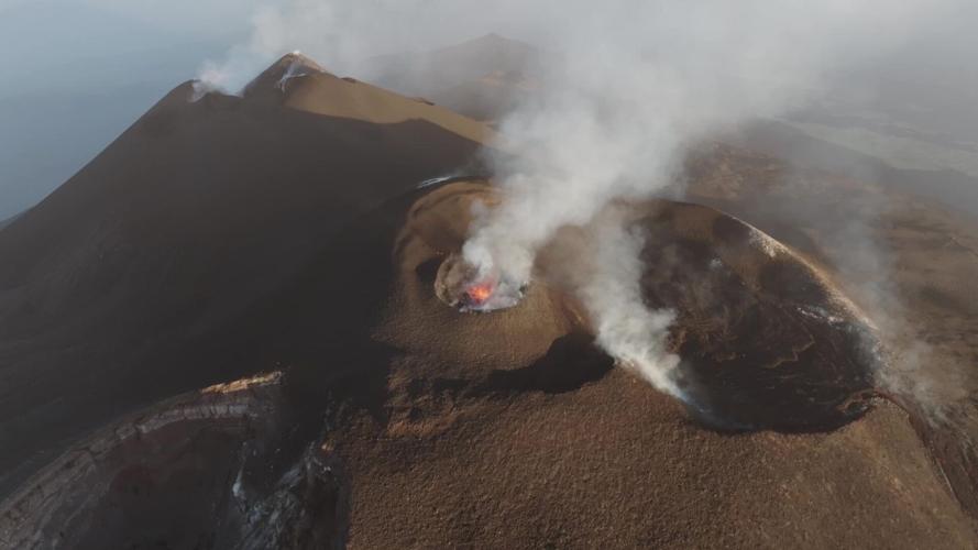 Rare footage shows powerful eruptions at peak of growing active volcano