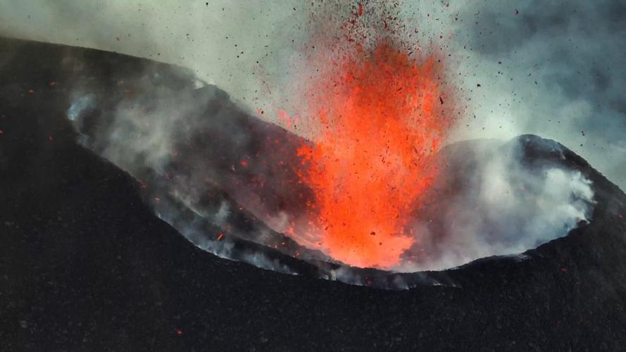 Rare footage shows powerful eruptions at peak of growing active volcano