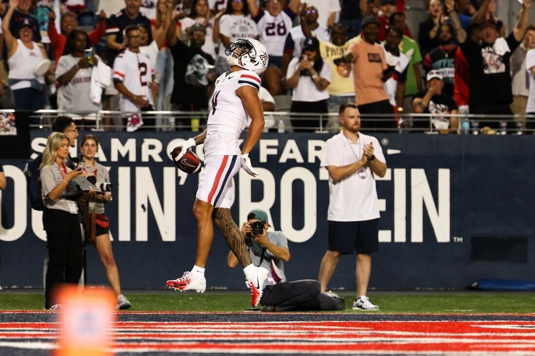 WR Tetairoa McMillan (304 Yards), No. 21 Arizona Outlast New Mexico ...