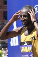 Ethiopia's Sisay Lemma wins Boston Marathon in runaway. Kenya's Hellen Obiri repeats in women's race