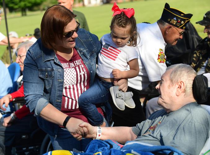 (WATCH) A solemn holiday Memorial Day ceremonies remember sacrifices