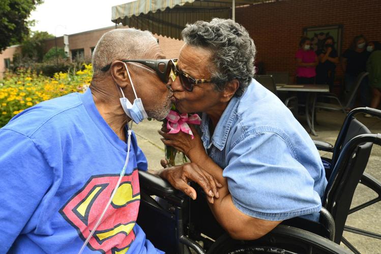 (WATCH) A reunion of love In Le Roy, a parking lot gathering brings