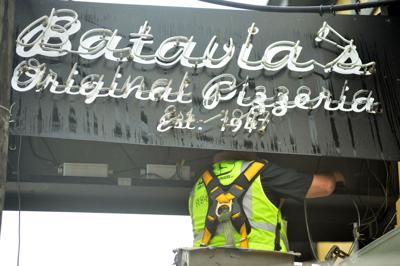 Sign work in the rain