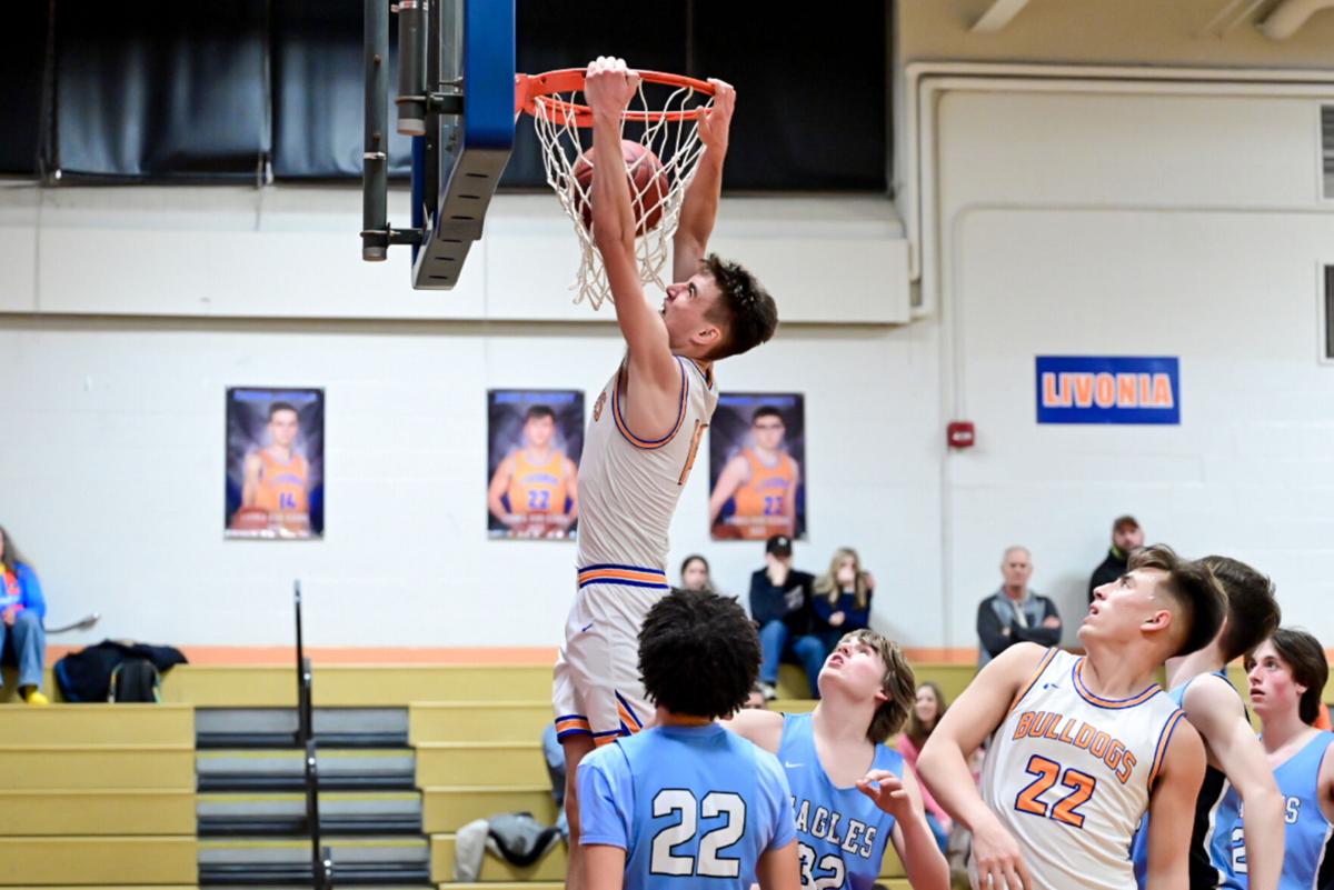 SEC. V BOYS BASKETBALL Coyle slams the door on Midlakes as Livonia