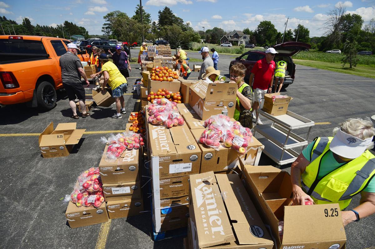 Pandemic dwindles: Salvation Army holds a last food ...