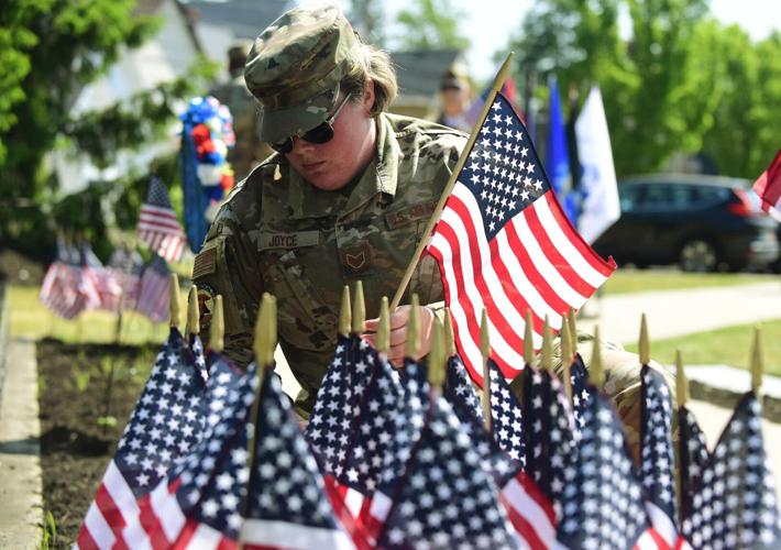 (WATCH) A solemn holiday Memorial Day ceremonies remember sacrifices