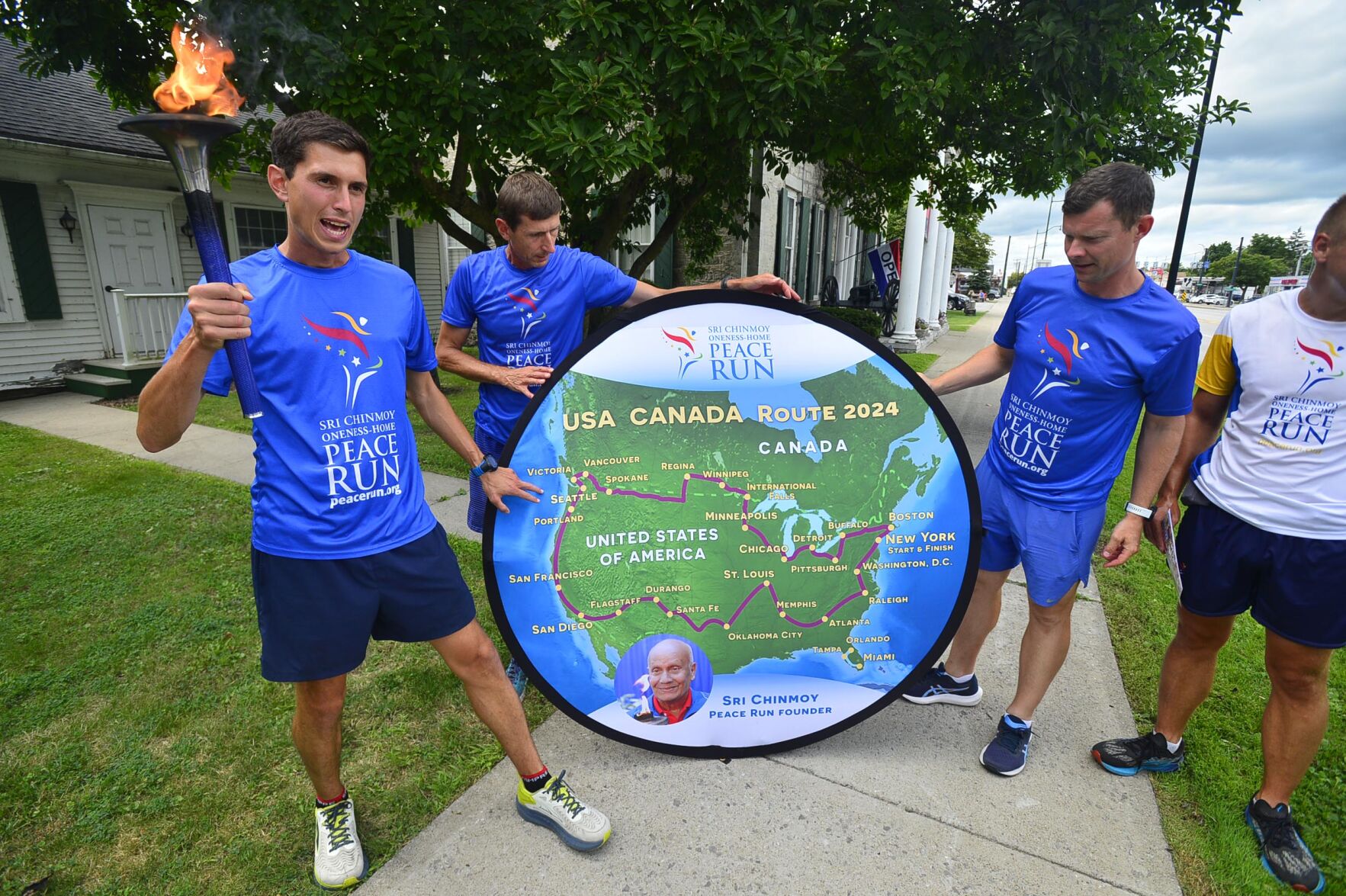 Goodwill Runner Goodwill visit: Peace Runners visit Genesee County | News ...