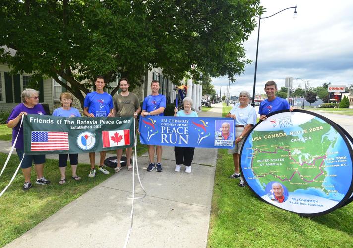 Goodwill Runner Goodwill visit: Peace Runners visit Genesee County | News ...