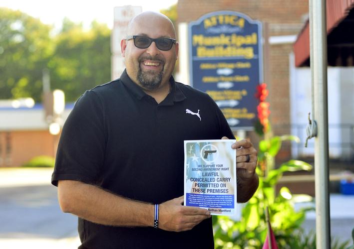 Second Amendment Attica mayor makes signs available for village