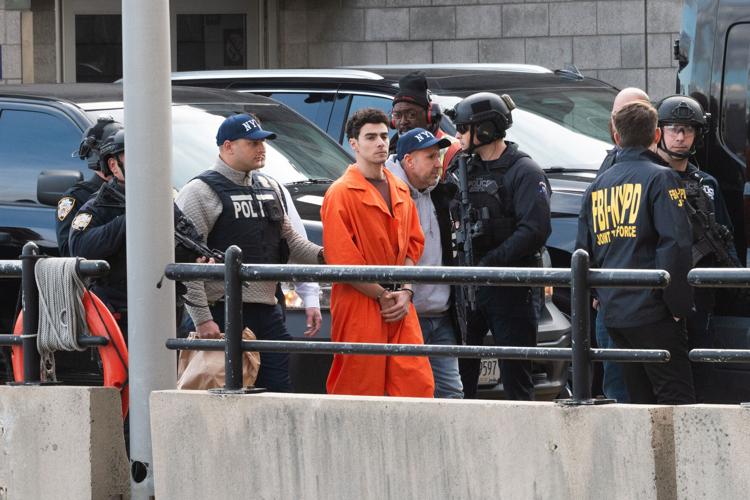 Accused CEO killer Luigi Mangione hit with federal charges that could ...