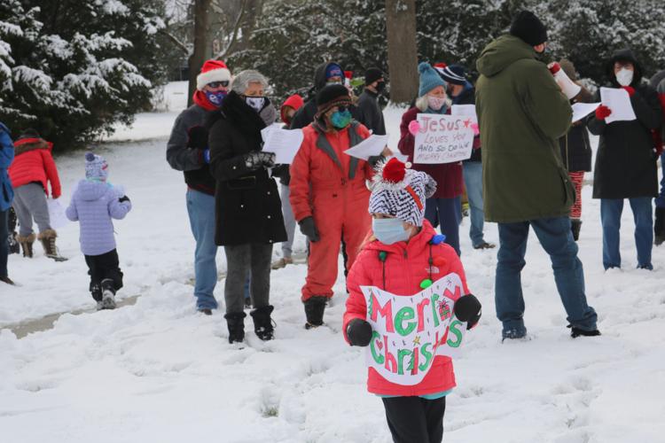Carolers bring LeRoy Village Green residents an early Christmas gift