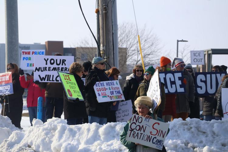 WATCH: 100 march in Batavia ICE facility protest, vigil | News ...