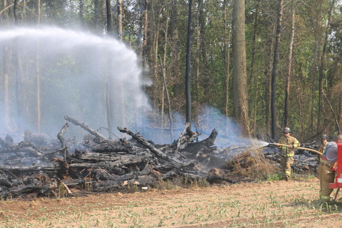Firefighters extinguish out-of-control burn in Albion | Local News ...