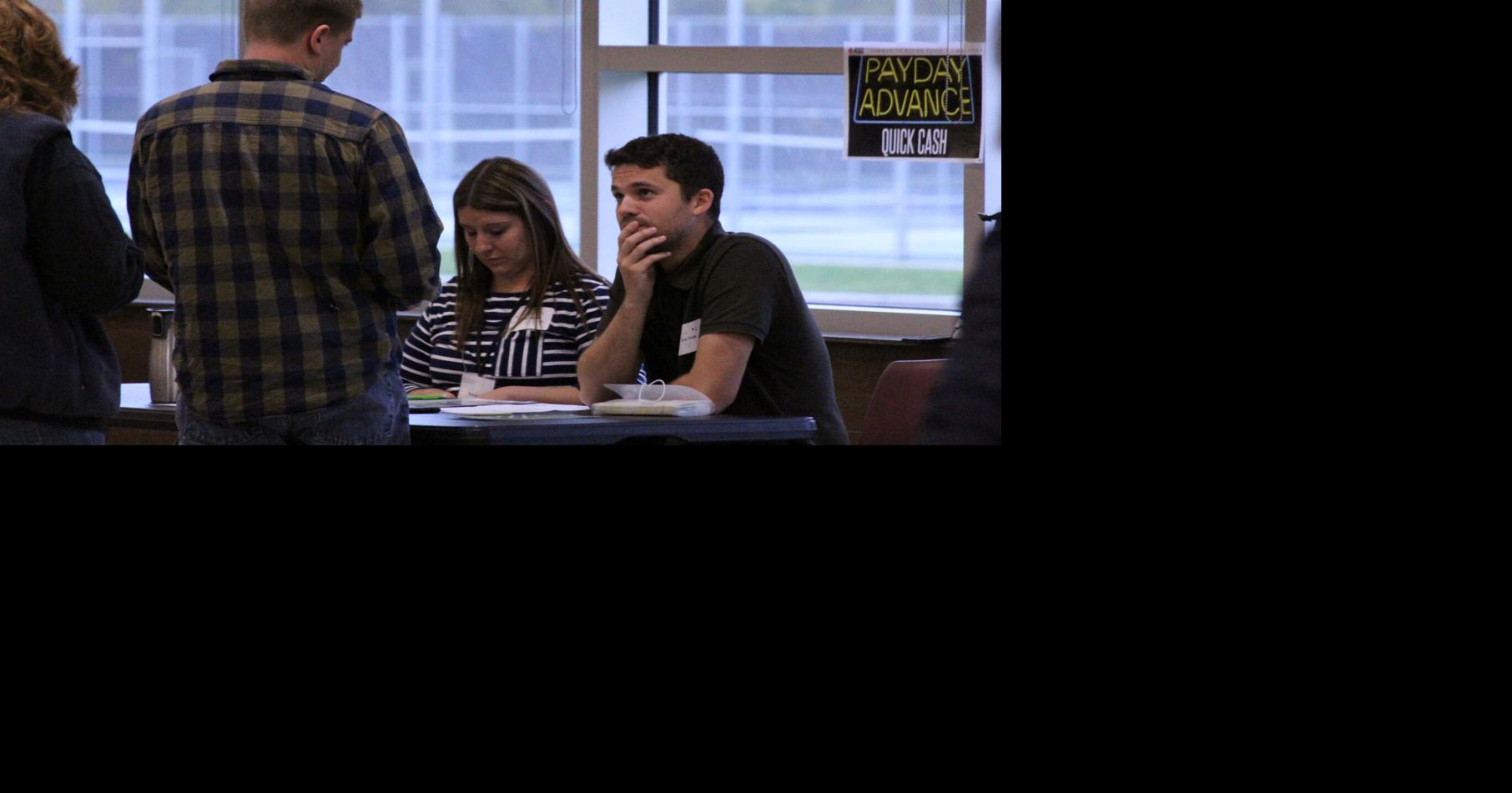 Poverty simulation ByronBergen staff explore realities