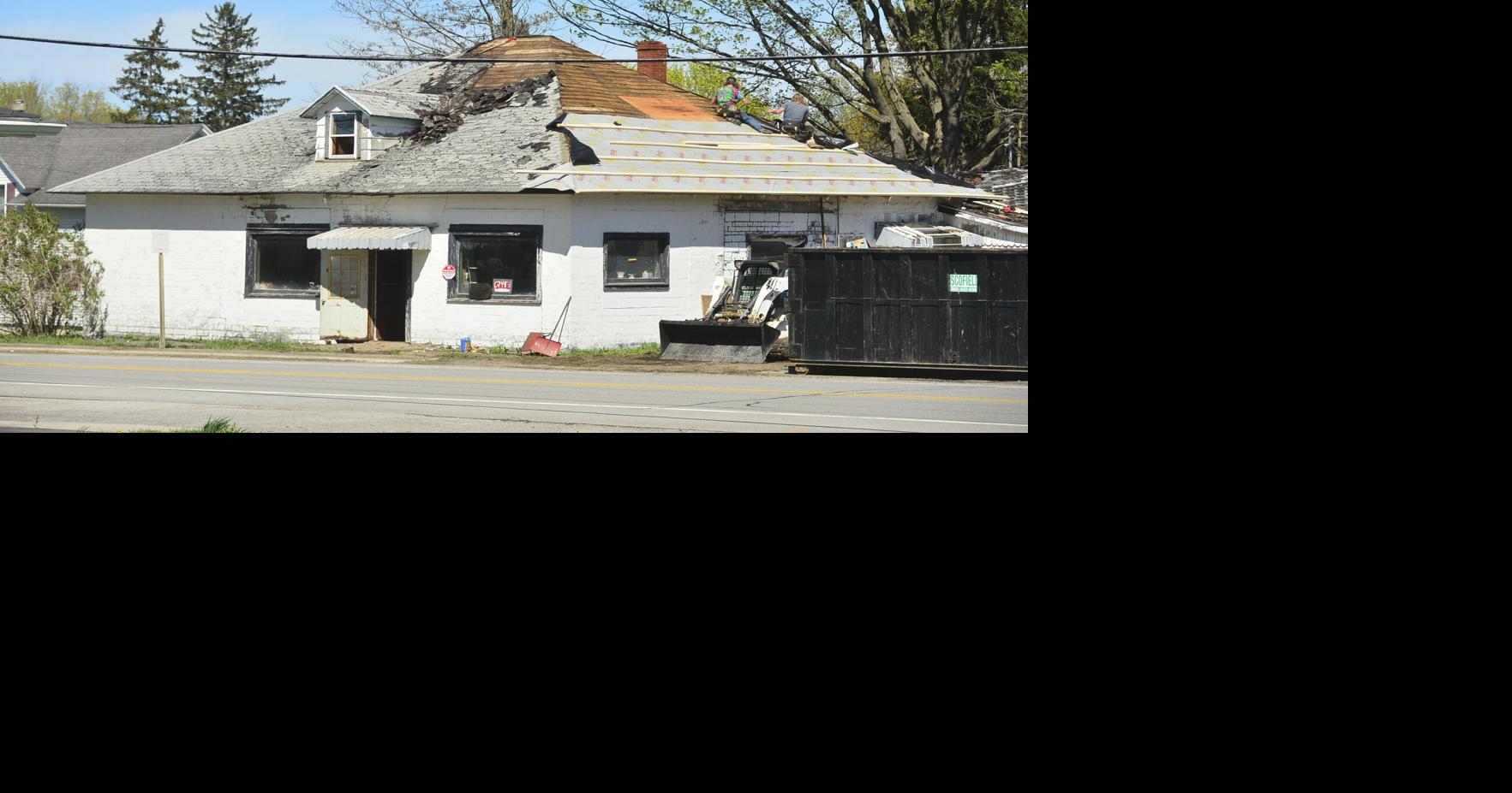 Cleanup and roof repairs underway at former Poor Boys | News ...