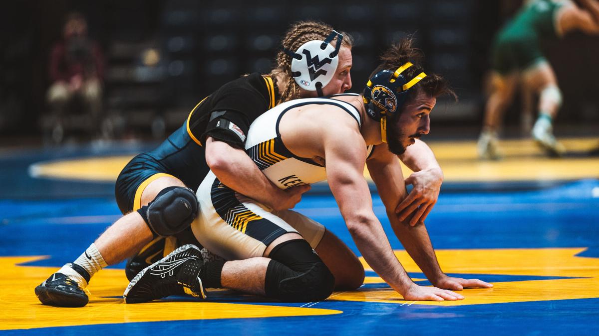 WVU wrestling overcomes late deficit