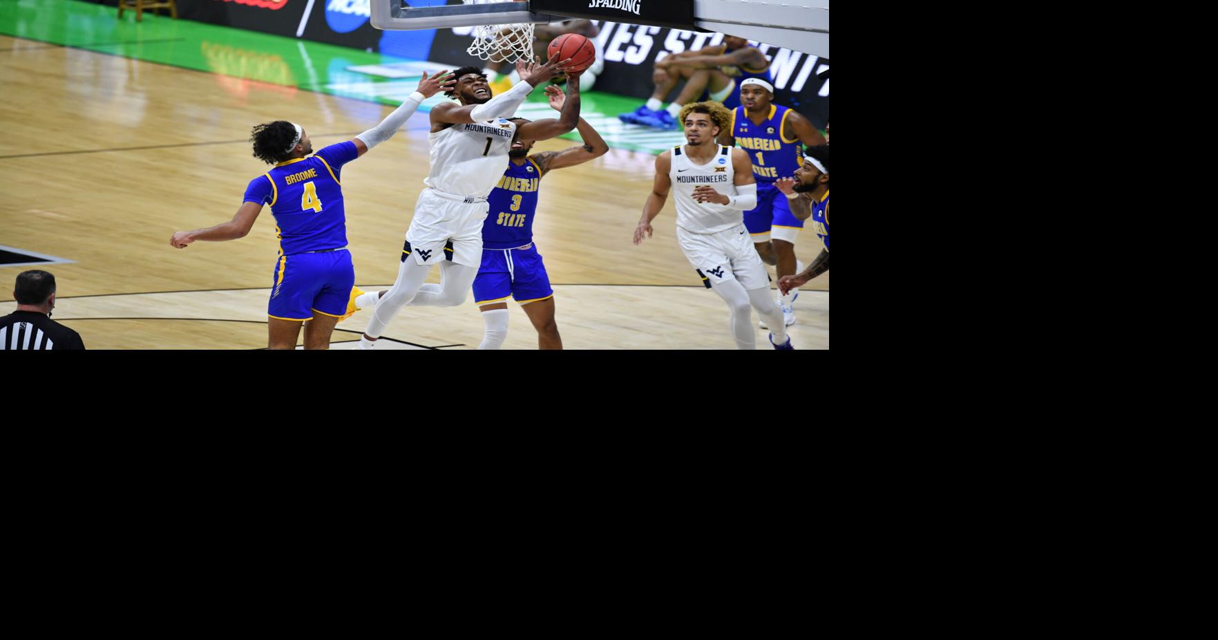 West Virginia faces off against former Big East rival Jim Boeheim and