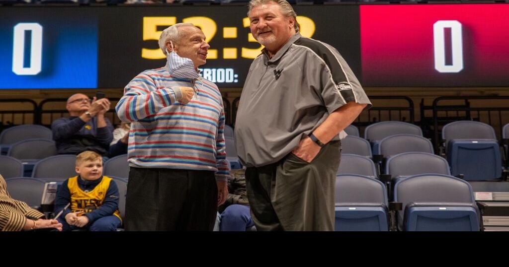 Roy Williams attends West Virginia basketball game, dons Mountaineer hoodie