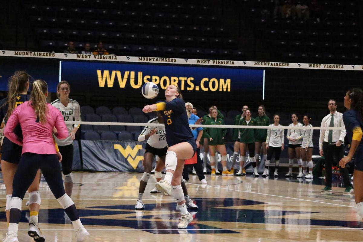 West Virginia's Lacey Zerwas (6) gets the ball against the Baylor Bears at the WVU Coliseum in Morgantown, W.Va., on Oct. 22, 2021. 
