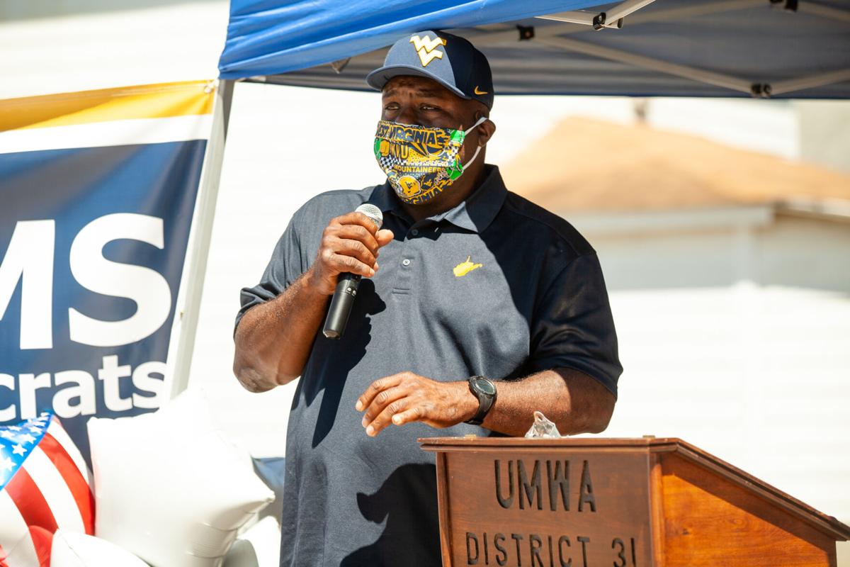 Former Mountaineer football player Major Harris speaks at the ribbon cutting ceremony for Democratic gubernatorial candidate Ben Salango campaign's field office in Morgantown on August 19, 2020 .