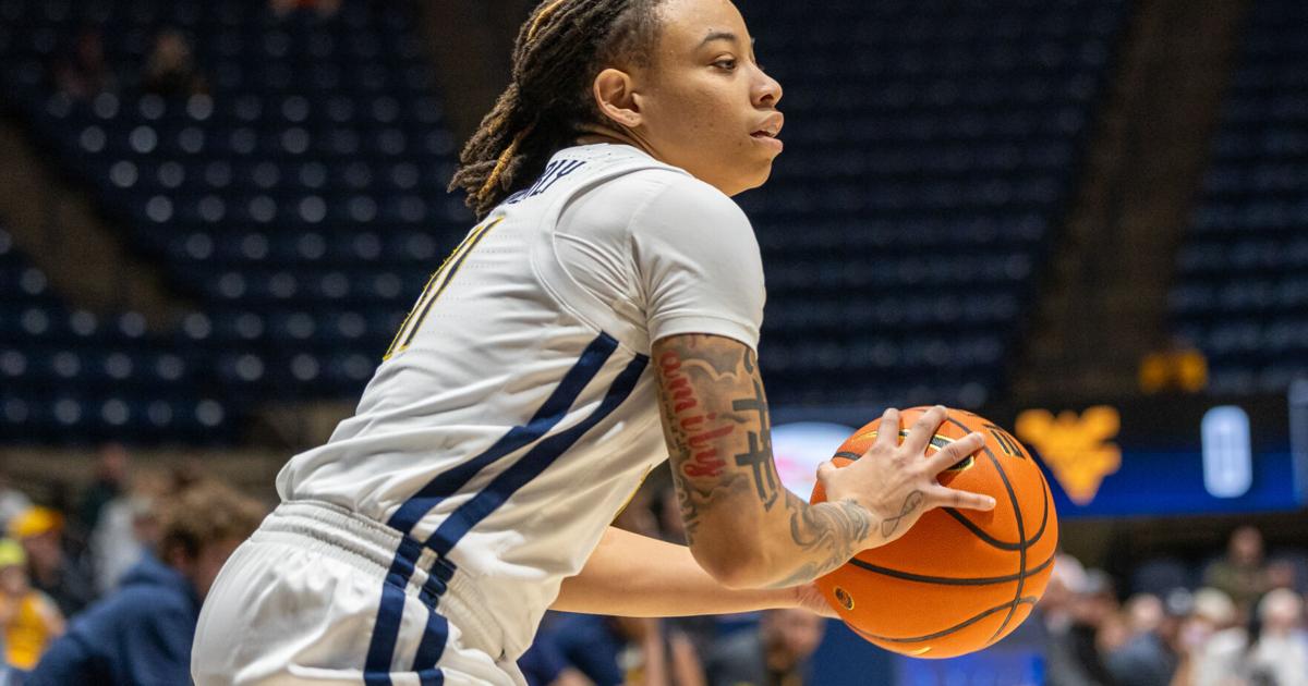 West Virginia defeats UCF, JJ Quinerly scores 1000th point | Women's ...