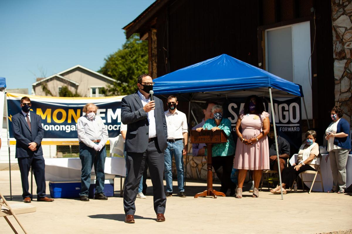 Monogahlia County Commissioner Jeff Arnett speaks at the ribbon cutting ceremony for Democratic gubernatorial candidate Ben Salango campaign's field office in Morgantown on August 19, 2020.