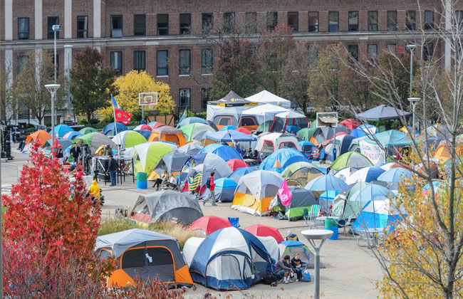 Students set up temporary living arrangements on Mountainlair Green in ...