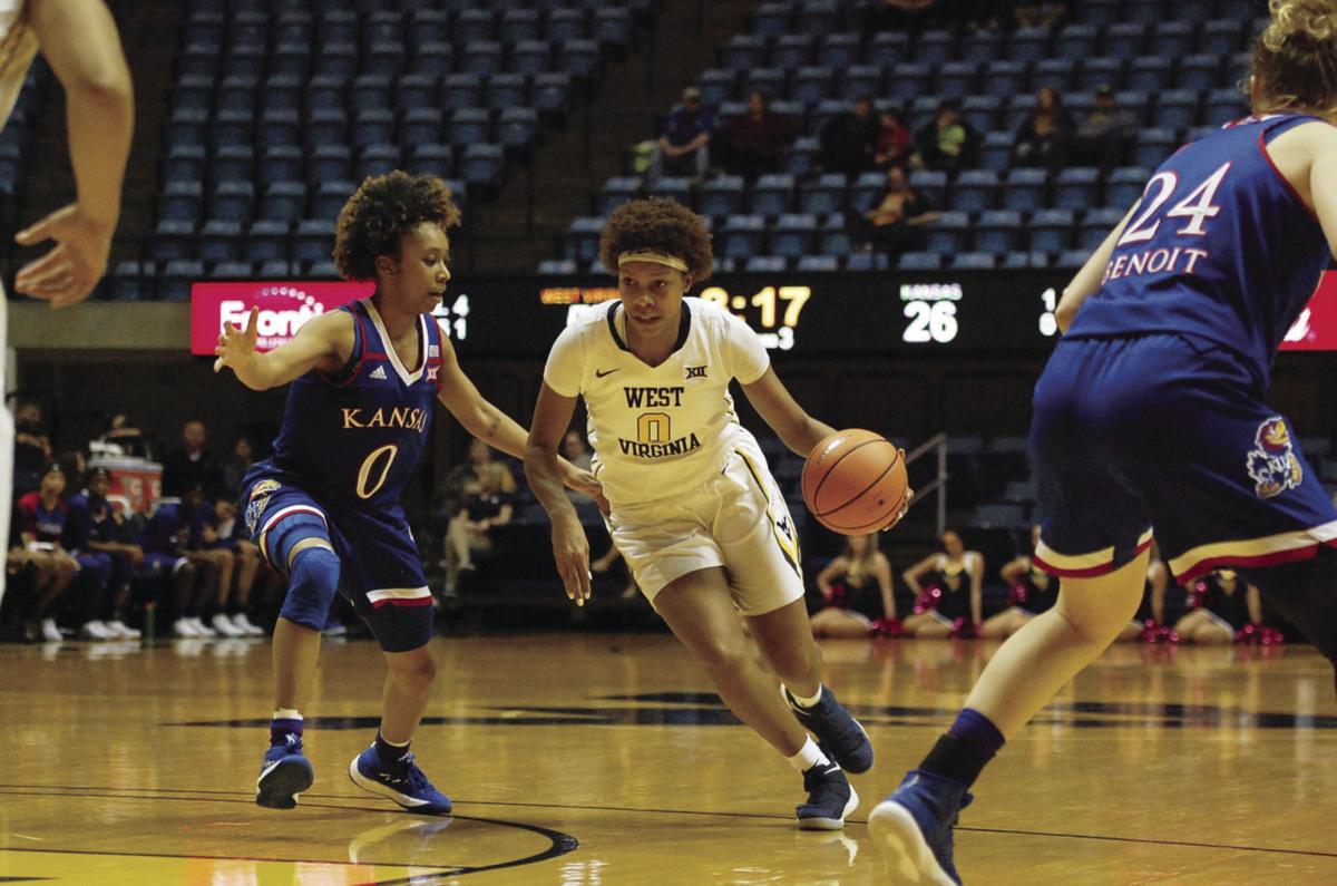 Wvu Defeats Kansas 75 61 Sports Thedaonline Com