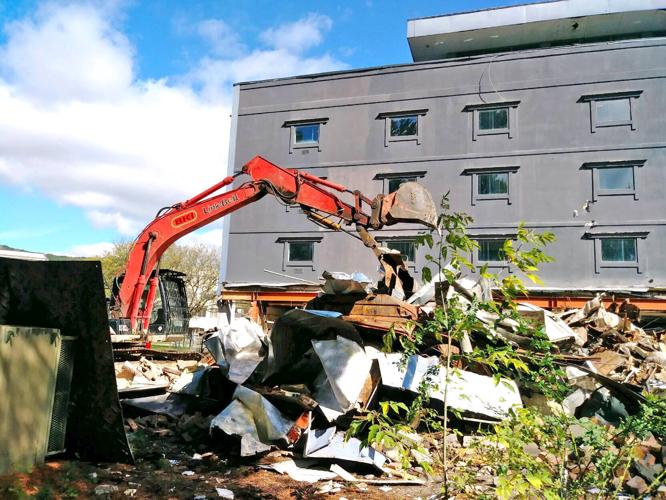 BUSINESS REVIEW: Nearly 60-year-old former hotel razed