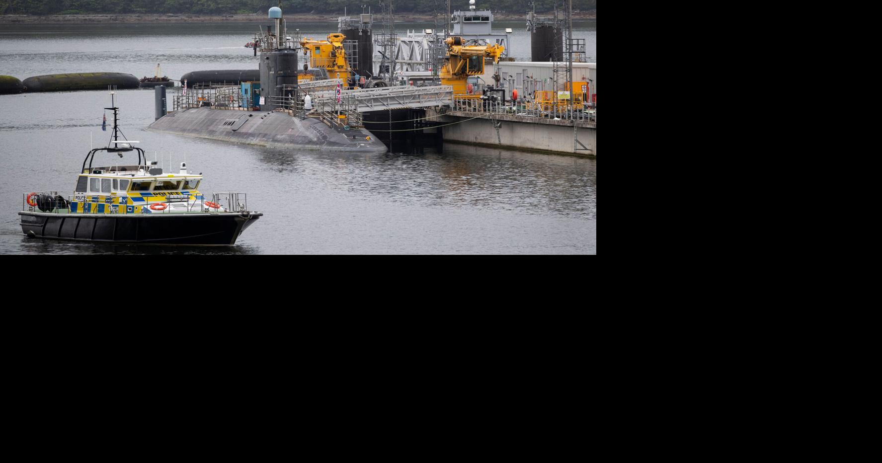 Iranian and Romanian charged after trying to enter UK's nuclear submarine base