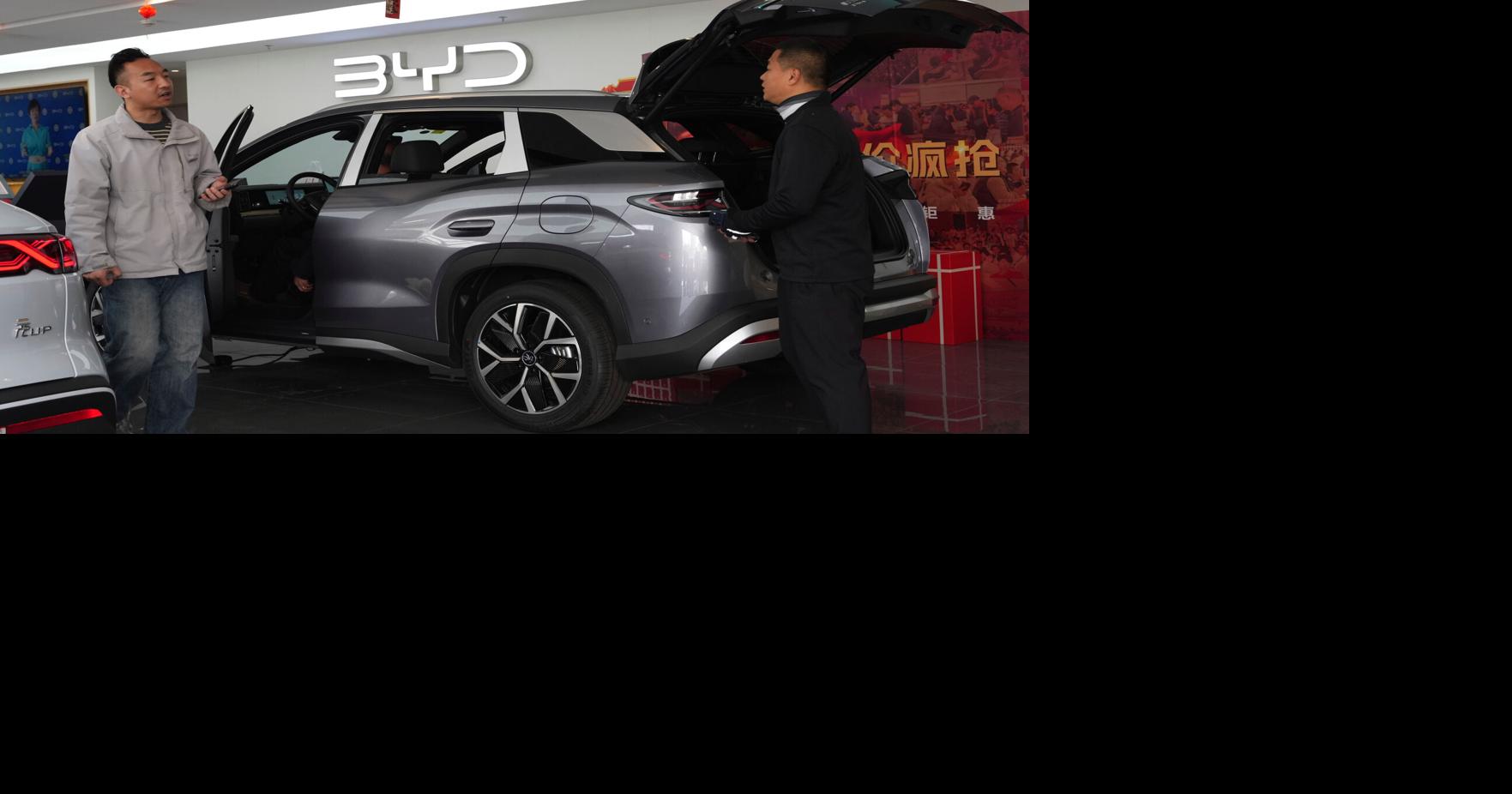 China's BYD sees first profit drop since 2021, even as the Tesla-rival takes global EV crown