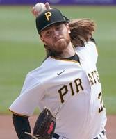 Peters solid in debut, but Pirates fall to Brewers, 2-1