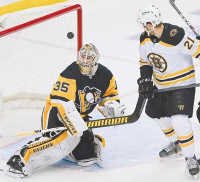 Malkin hits milestone in Pens' 4-1 win