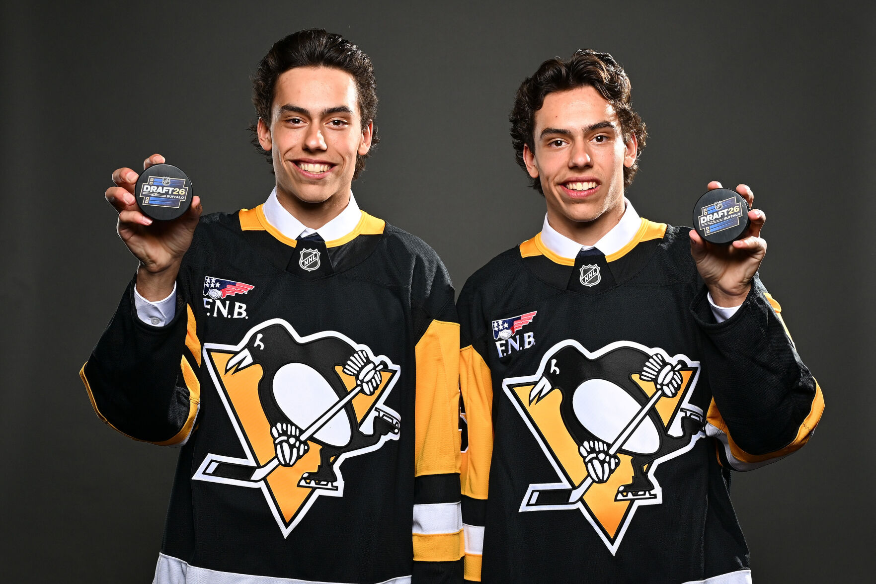 Penguins take twin brothers with their first two picks in the 2026 NHL ...