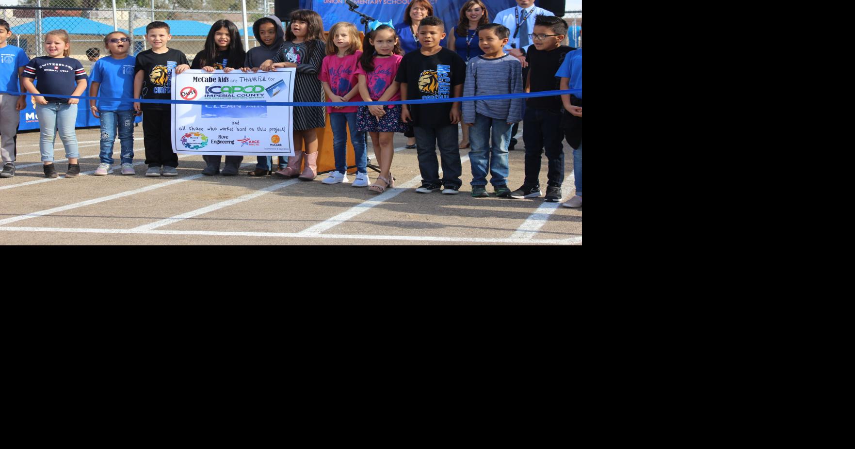 McCabe cuts ribbon on new paved lot | News | thedesertreview.com