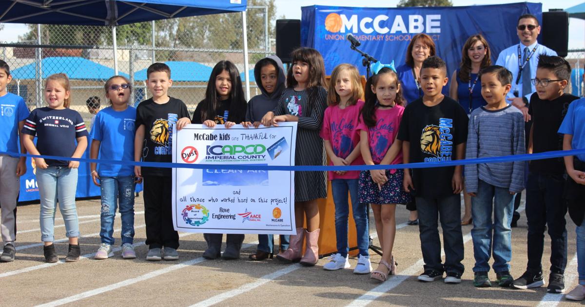 Mccabe Elementary McCabe cuts ribbon on new paved lot | News | thedesertreview.com