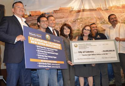 The City of Calexico receiving a check for $28 million dollars for the New River Improvement Project
