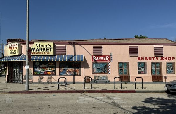 Storefront murals next to Vince's Market