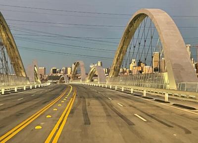 Arches of the Sixth Street Bridge with Downtown skyline in background 600