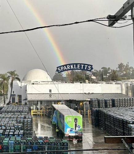 Rainbow over Sparkletts sign, dome and trucks | | theeastsiderla.com