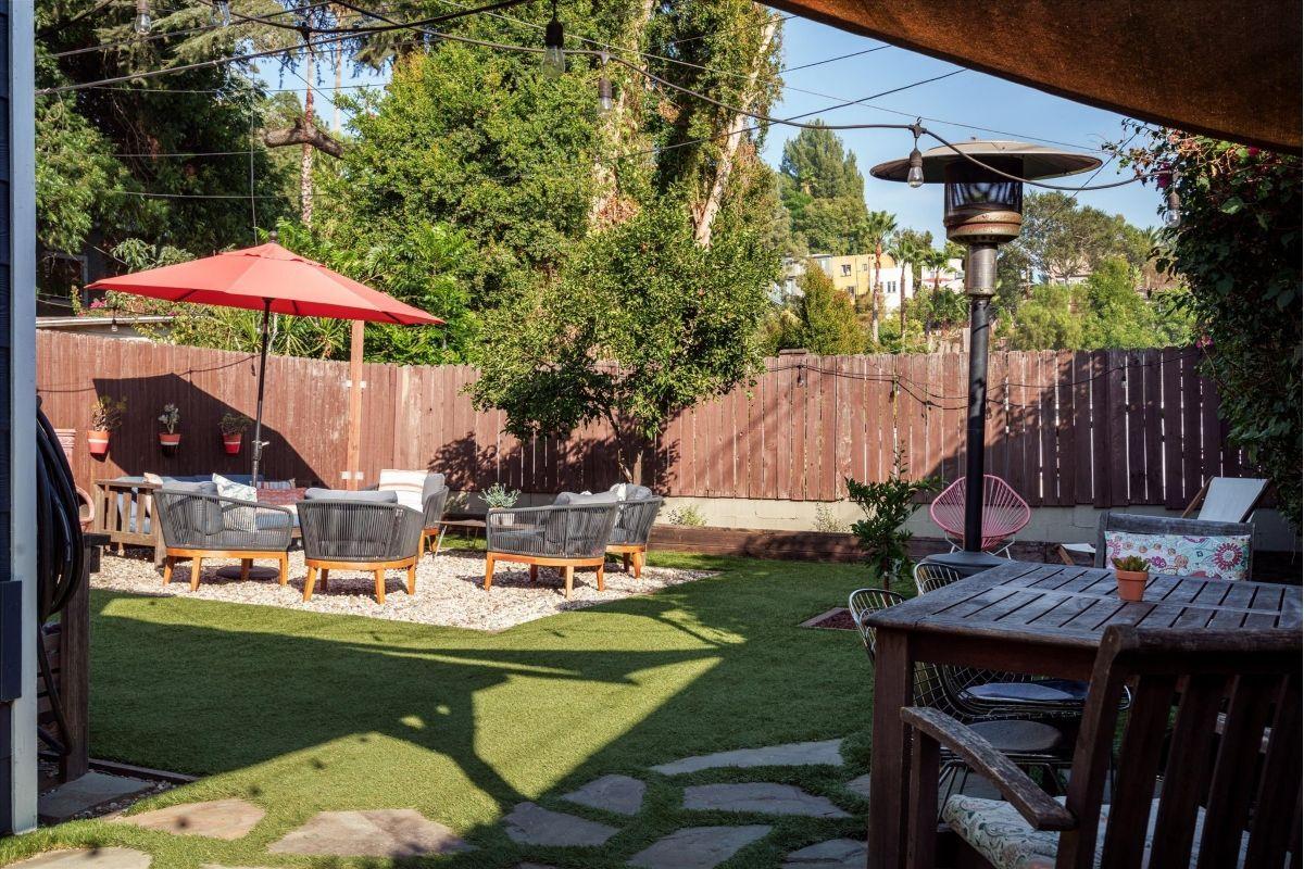 Spacious back yard and patio with seating area Sponsored