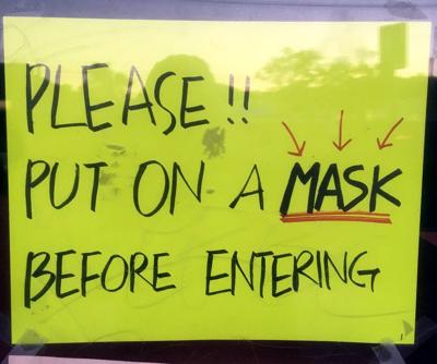 Please put on a face mask coronavirus sign
