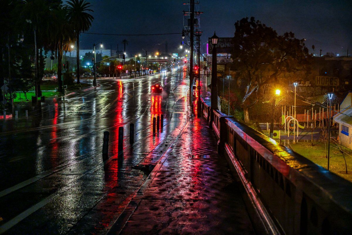 city sidewalk at night