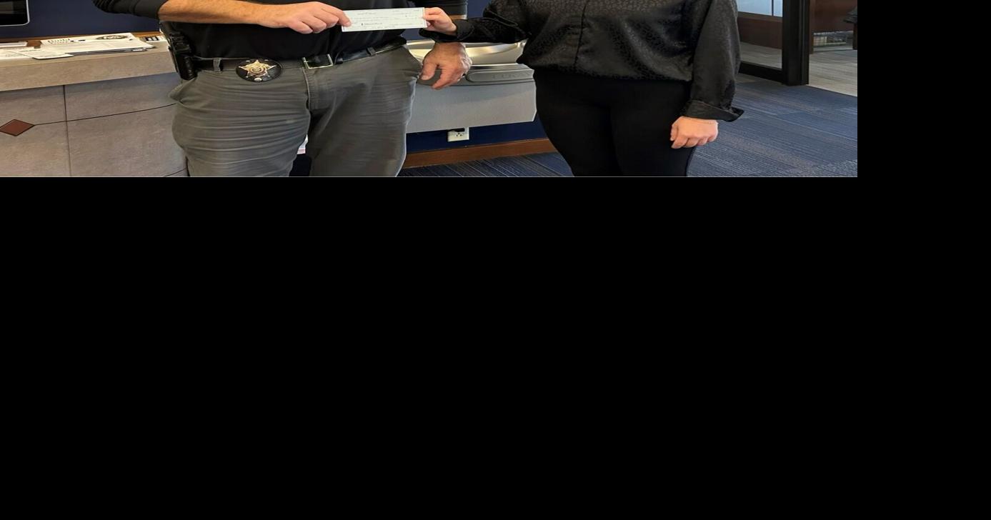 St. Marys-Minster Bank employees donate to Shop with the Blue