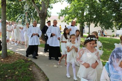 Pilgrims journey to honor Mary