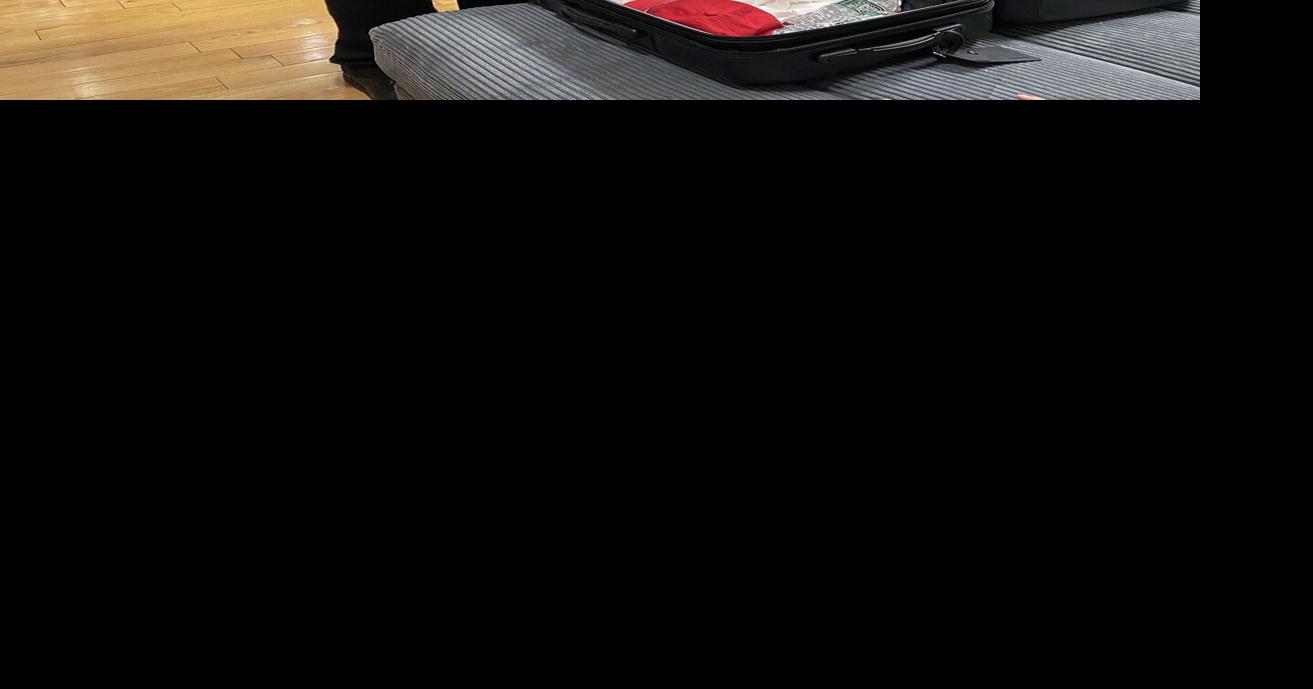 Beach-bound bishop-elect packs faith, memories for Florida